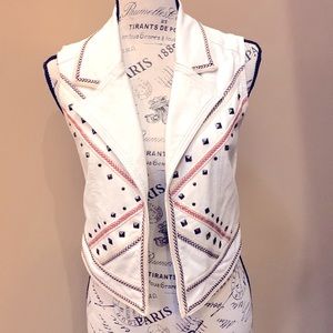 Forever 21 faux leather studded vest. Red and navy trim . Size small